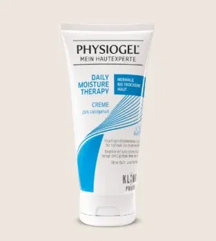 Physiogel Creme gegen trockene Haut in einer Hand
