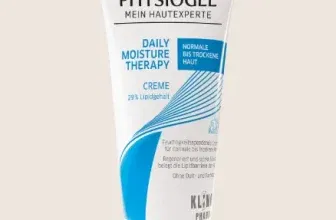 Physiogel Creme gegen trockene Haut in einer Hand