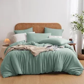 Luowei Baumwolle Bettwäsche 2 Bettbezüge mit Reißverschluss und 2 Kissenbezüge 80x80cm für 9,99 € inkl. Prime-Versand