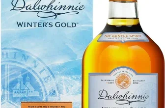 Dalwhinnie Winter's Gold Whisky-Flasche neben der blauen Verpackung mit Distillery-Logo