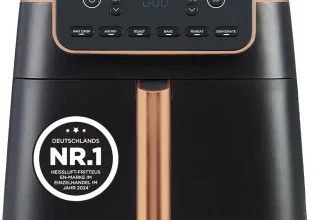 Eine schwarze Heißluftfritteuse mit goldenen Akzenten und einem digitalen Display