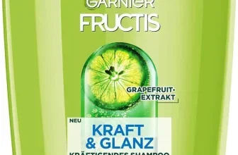 Grüne Garnier Fructis Kraft & Glanz Shampoo-Flasche mit Pumpspender und Grapefruit-Abbildung