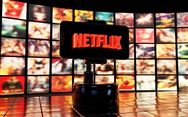 Netflix App auf Smartphone vor Streaming-Inhalten als Symbol für Account Sharing