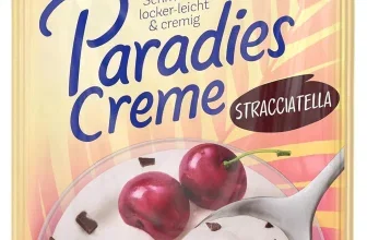 Eine Tüte Dr. Oetker Paradies Creme Stracciatella mit einer Abbildung von einer Schale Creme mit Schokoladenstücken und Kirschen