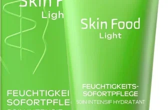 Grüne Weleda Skin Food Light Tube und Verpackung mit weißem Deckel auf weißem Hintergrund