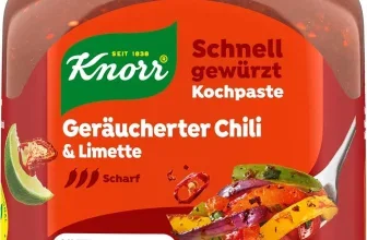 Ein Glas Knorr Schnell gewürzt Kochpaste Geräucherter Chili & Limette mit grünem Deckel und rotem Etikett