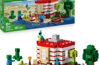 Ein LEGO Minecraft Bausatz mit grüner Verpackung, rotem Dach, blauen Figuren und grünen Monstern