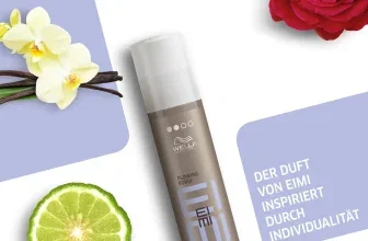 Ein Produktfoto zeigt eine braune Tube mit weißem Deckel, daneben eine Limettenhälfte, eine weiße Blume mit grünen Blättern und braunen Vanilleschoten, sowie eine rote Rose.