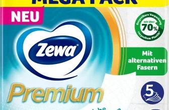 Ein großes, rechteckiges Paket Toilettenpapier mit einem gelben Band, das "MEGA PACK" in blauen Buchstaben zeigt, einem großen, blauen Herz-Logo mit "Zewa" in der Mitte und einem grünen Kreis, der den Recyclinganteil hervorhebt.