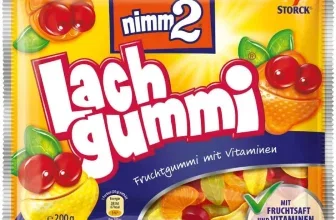 Ein gelber Beutel Storck Lachgummi mit roten, grünen und orangefarbenen Fruchtgummis