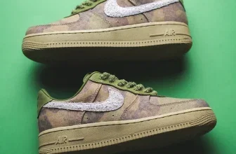 Nike Air Force 1 Low Camo Asparagus und Chlorophyll Sneaker mit weißem Swoosh auf grünem Hintergrund