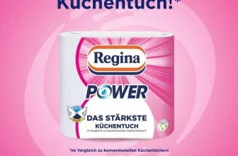 Einzelne Rolle Regina Power Küchentuch vor pinkem Hintergrund mit Slogan