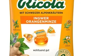 Gelbe Ricola Ingwer Orangenminze Beutel Packung ohne Zucker mit Kräuterabbildungen