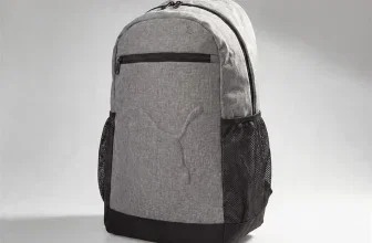 Grauer Puma Buzz Rucksack mit schwarzen Netzseiten und Logo