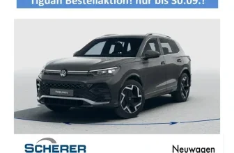 Grauer VW Tiguan SUV mit R-Line Front und Felgen vor weißem Hintergrund mit Scherer Logo