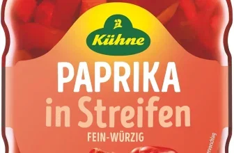 Glas mit Kühne Paprika in Streifen, fein-würzig, mit grünen Deckel und orangefarbenem Etikett
